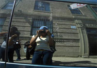 photographer reflected in glass image